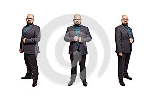 Young bald bearded man with glasses and a full-length suit. Isolated over white background.