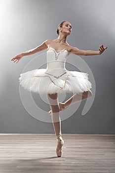 Young ballerina in ballet pose classical dance