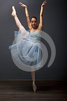 Young ballerina in ballet pose classical dance