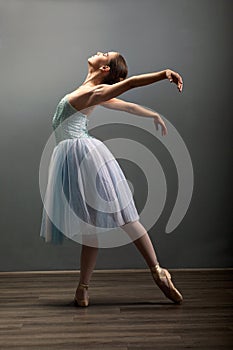 Young ballerina in ballet pose classical dance