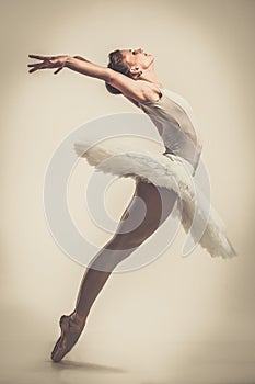 Young ballerina dancer in tutu photo