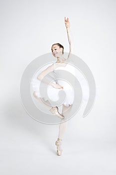 Young ballerina practising ballet moves