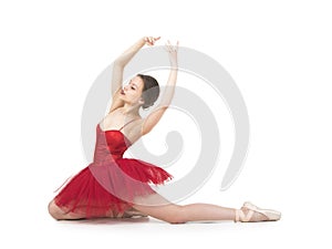 Young ballerina in a red tutu.