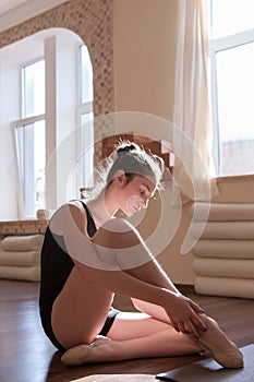 Young ballerinas lesson. Thoughtful mood