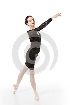 Young ballet dancer in elegant pose