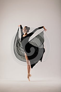 Young ballet dancer isolated on white background