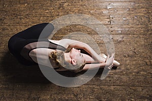 Young ballet dancer practicing in class.