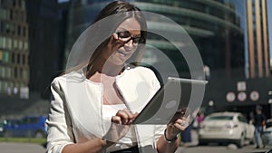 Young banker chief businesswoman in glasses and white jacket