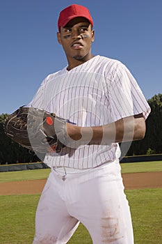Young Baseball Pitcher Standing On Field