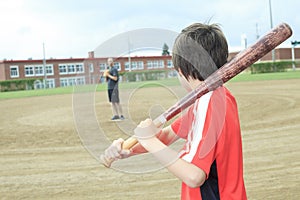 Young baseball player in a field