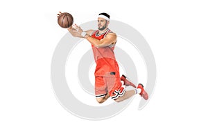 young basketball player catching ball in jump