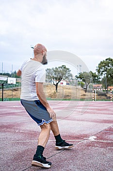 Young basketball player dribbling the ball