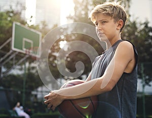 Young basketball player shoot