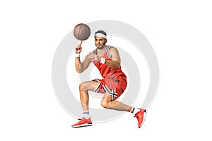 young basketball player spinning ball on finger