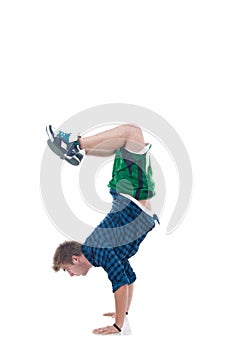 Young bboy standing on hands photo