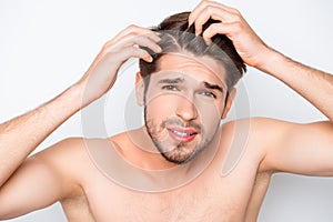 Young bearded man expecting his hair for furfur
