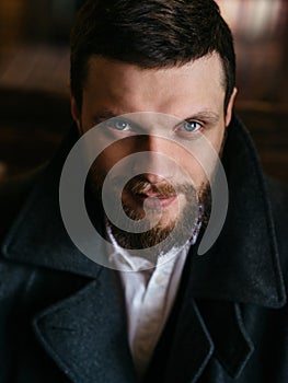 Young bearded man in a pub, vintage style