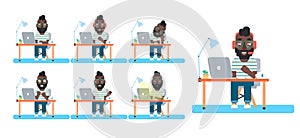 Young bearded man working on the computer.