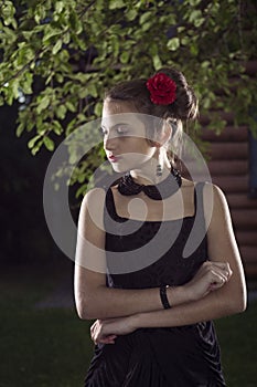 Young beatifull girl in black dress