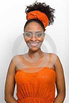 Young beautiful African woman with Afro hair wearing traditional clothes