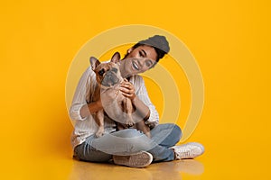 Young Beautiful Afro Woman Posing With Ger Cute Dog In Studio