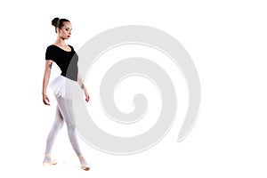 Young beautiful ballet dancer isolated over white background