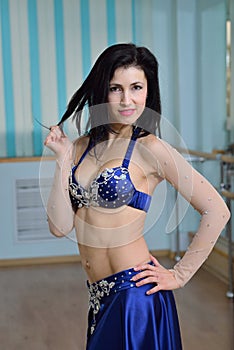 Young Beautiful Belly dancer in arabic costume, oriental dance