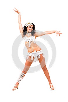 Young beautiful belly dancer in a white costume