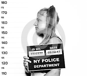 Young beautiful blonde woman Criminal Mug Shots. black and white