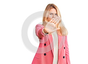 Young beautiful blonde woman wearing elegant clothes doing stop sing with palm of the hand