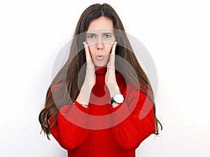 Young beautiful brunette woman in red sweater thinking looking to the side at blank copy space, isolated over white background