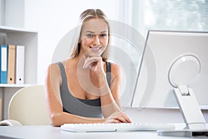 Young beautiful business woman with computer