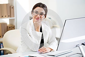 Young beautiful business woman with computer