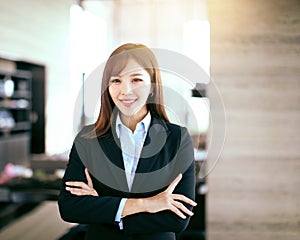 Young beautiful business woman standing in