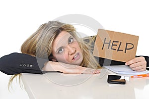 Young beautiful business woman suffering stress working leaning sad on office desk asking for help