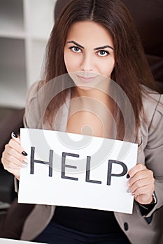 Young beautiful business woman suffering stress working at office asking for help feeling tired