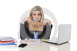 Young beautiful business woman suffering stress working at office asking for help feeling tired