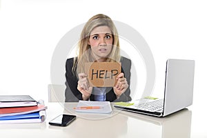 Young beautiful business woman suffering stress working at office asking for help feeling tired