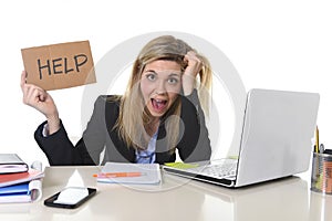 Young beautiful business woman suffering stress working at office asking for help feeling tired