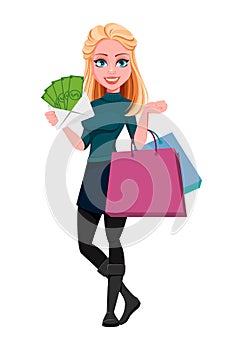 Young beautiful business womanYoung beautiful business woman holding shopping bags and money