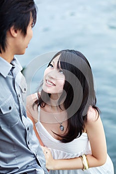 Young beautiful Chinese girl enjoys intimacy