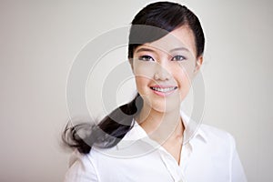 Young, beautiful chinese woman smiling