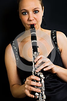 Young beautiful clarinetist