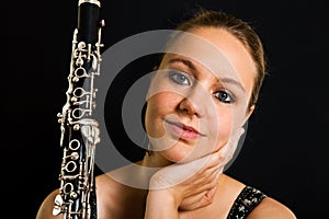 Young beautiful clarinetist