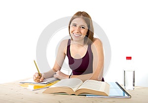Young beautiful college student girl studying happy confident and positive