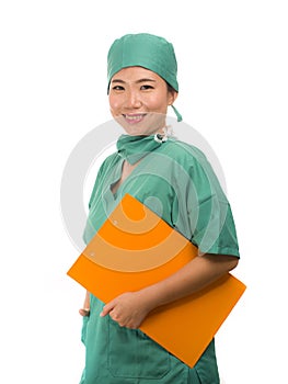 Young beautiful and confident Asian Korean medicine doctor or hospital nurse woman smiling happy holding medical reports clipboard