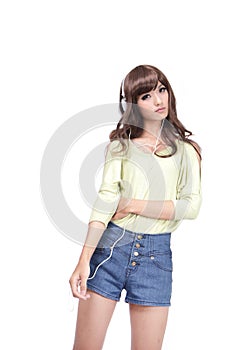 Young beautiful cool woman listen music