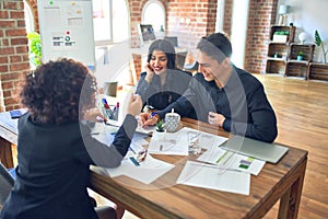 Young beautiful couple applying for mortgage