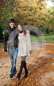 Young beautiful couple at fall