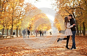Young beautiful couple at fall